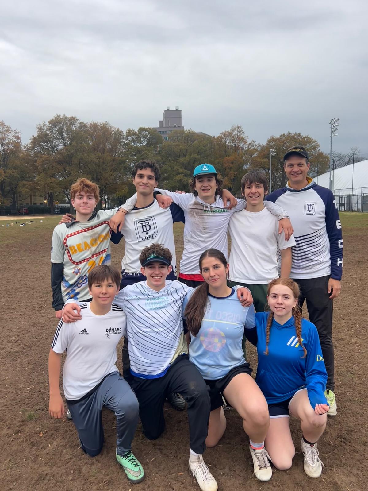 Players from a previous Brooklyn Disco Tech Support Hat Tournament posing together on the field